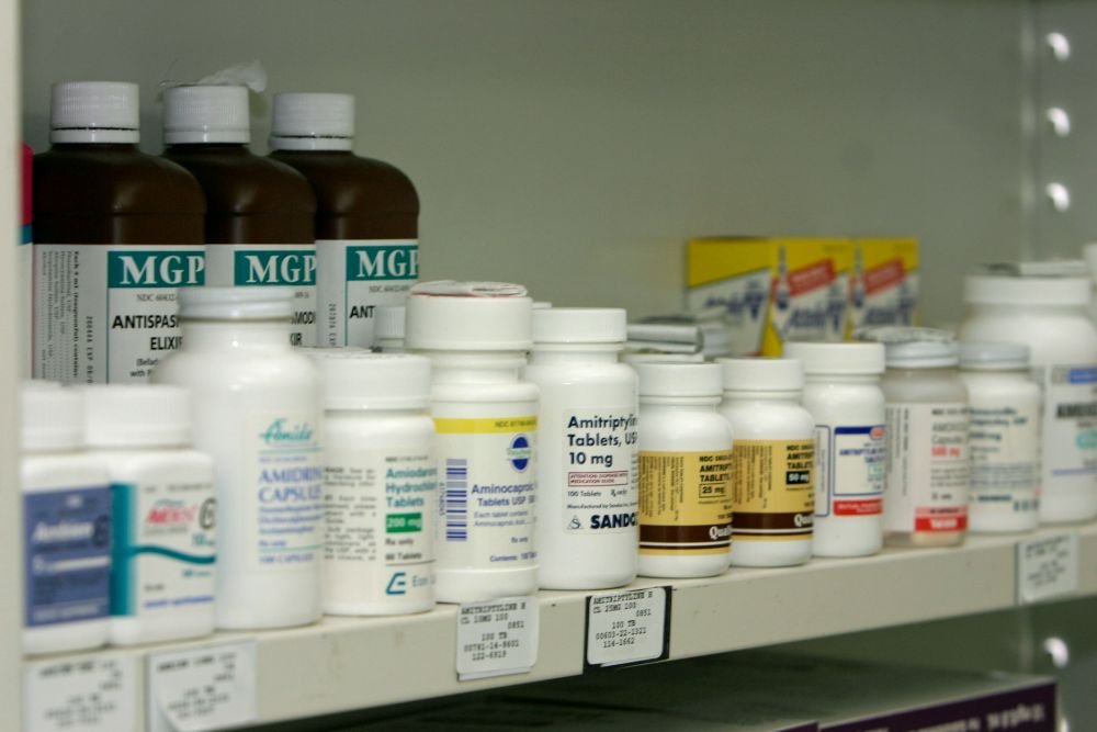 Pharmacy shelves stocked with medicine